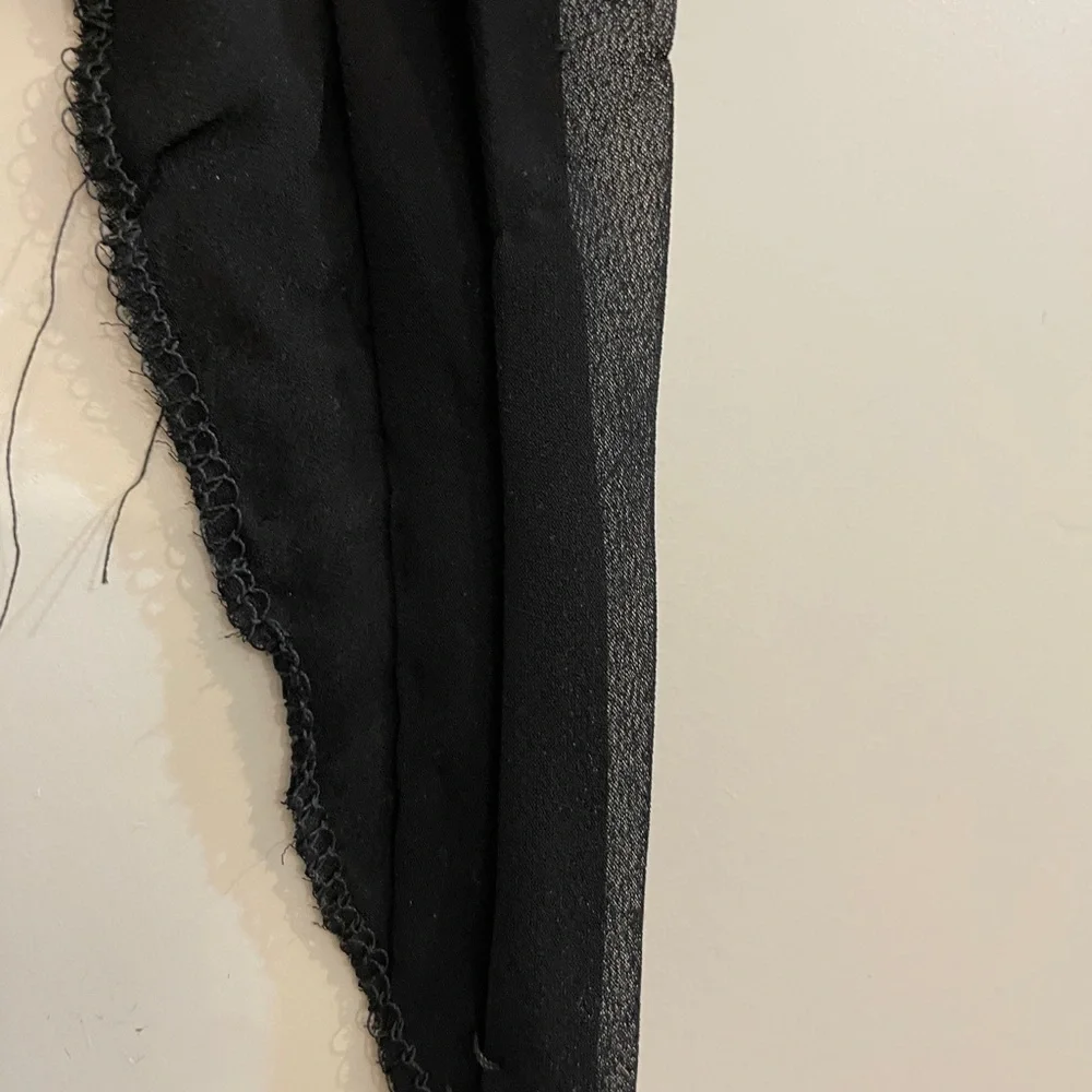 David’s Bridal V-Neck Black Halter Maxi dress with pleated and ruffle detail. - Picture 12 of 12